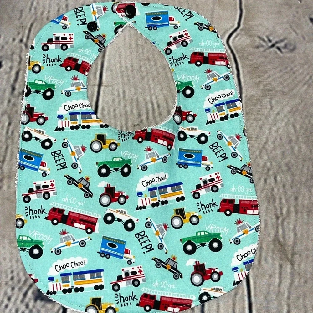 Designer handcrafted transportation bib
